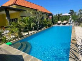 Dream Beach Hostel Lembongan，位于蓝梦岛桑迪湾海滩俱乐部附近的酒店