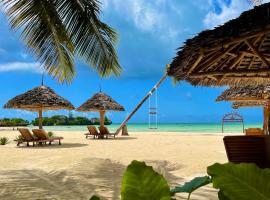 Karibu Beach Resort，位于蓬圭的带泳池的酒店