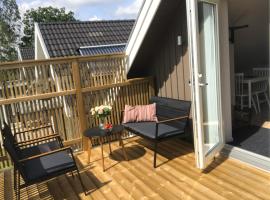 Fin lägenhet i Falkenberg, Tröingeberg 5min från E6，位于法尔肯贝里的酒店
