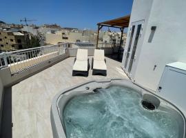 The Willows Penthouses with Jacuzzi，位于Għajn il-Kbira的公寓