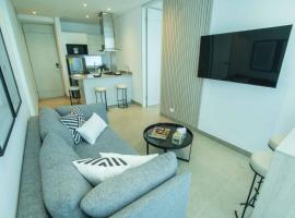 Suite de lujo Distrito 90，位于巴兰基亚的带按摩浴缸的酒店