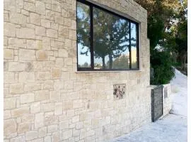 Cosmema Stone house with amazing mountain view