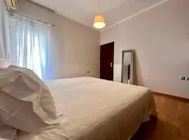 Central apartment in quiet neighborhood near sandy beach