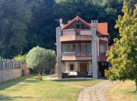 Casa con amplio jardín en Pechón，位于佩琼的酒店