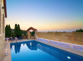 Elena Villa, an Authentic Retreat with Private Pool, By ThinkVilla，位于Roussospítion的酒店