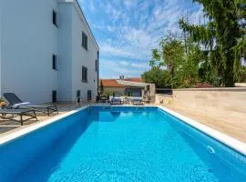 Nice Apartment In Malinska With Outdoor Swimming Pool, Wifi And 2 Bedrooms