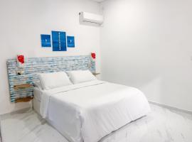 Fins Dive and Leisure Hotel，位于拉斯杜的酒店