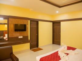 sri balaji grand hotel，位于库姆巴科纳姆乌皮里潘寺附近的酒店