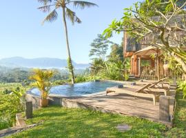 Romantic Barn with Mt. Agung Views，位于希德门的木屋