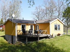 Nice cottage with a view of Teåkerssjon，位于Dalskog的度假屋