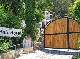 Swiss Eviniz Hotel - Adult Hotel，位于阿德拉桑阿德拉桑海滩附近的酒店