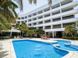 Hotel California Playa El Yaque，位于圣地亚哥马里诺将军机场 - PMV附近的酒店