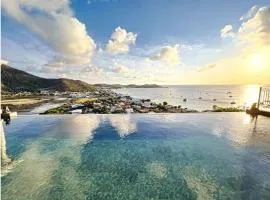 Frangipani Room in shared Villa Diamant, swimming pool, sea view