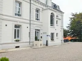 Hôtel Échappée en Baie - Parking privé gratuit dont forfaits bornes électriques réservable