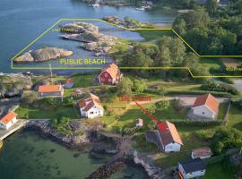 Holiday house with sea views and private beach on Tjorn，位于Höviksnäs的酒店