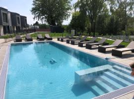 25h SPA-Residenz POOLs IN & OUT, private Garden & Beach，位于滨湖新锡德尔的酒店