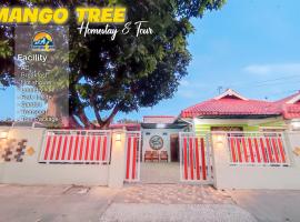 Mango Tree Homestay & Ijen Tour，位于外南梦的民宿