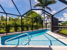 NEW! Dock Canal Family Home w/Pool & Gulf Access!，位于北迈尔斯堡Edison Ford Winter Estates附近的酒店