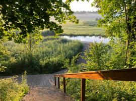 Pustelnia Supraśl - domki nad rzeką，位于苏普拉希尔的度假园