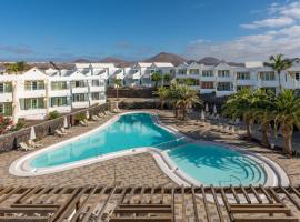 Apartamentos LIVVO Morromar，位于卡门港的带泳池的酒店