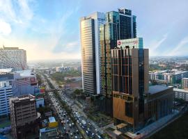 万达贝斯特韦斯特优质大酒店，位于暖武里府的带泳池的酒店