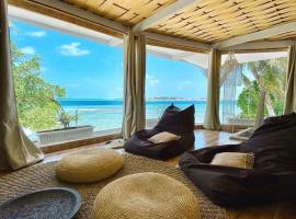 Samura Maldives Guest House Thulusdhoo，位于图鲁斯杜的海滩短租房