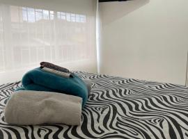 Lindos apartaestudios y habitaciones en Ibague，位于伊瓦格的度假短租房