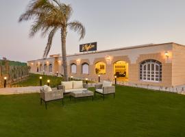 Le Royal Marina Hotel，位于阿莱曼Marina El Alamein的酒店