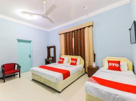 Super OYO 110 Ras Al Hadd Guest House，位于阿尔哈德的酒店