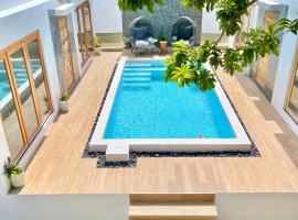 Moringa Resort - Studio A with Pool open air shower & Bath，位于威廉斯塔德的带按摩浴缸的酒店