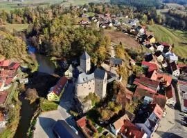 Ferienwohnung und Sommerhaus unter der Burg