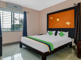 Treebo Trend Grand Jp Inn 3 Km From Gundlupet Bus Stand，位于Gundlupet的酒店