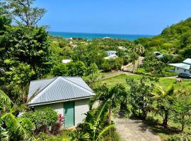 Le Surf Lodge, chambre avec vue mer dans un écrin de verdure，位于德赛的住宿加早餐旅馆