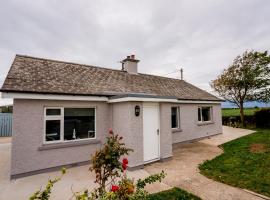 Holmestead Cottage，位于Tyrella的酒店