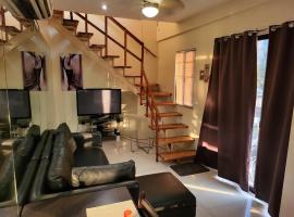 Sheryll Escapes - Kandi Resort-type Spacious 1 BR loft with Netflix and free Housekeeping，位于安吉利斯的酒店