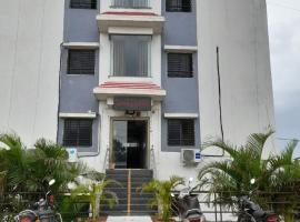 Hotel Vrundavan By WB Inn，位于Ranjangaon的酒店