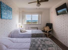 Portobello Suites Hotel，位于拉帕洛马的酒店