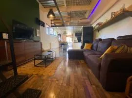 Gîte du Silo Loft atypique ,Tournesol , spa&piscine couverte