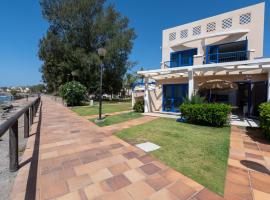 Apartamentos Playa Feliz，位于英格兰海滩的酒店