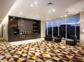 泗水中心智选假日酒店，位于泗水的假日酒店