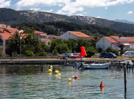 Apartments and rooms by the sea Palit, Rab - 5010，位于拉布的酒店