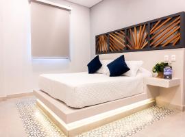 The Garden Suites，位于圣玛尔塔的酒店