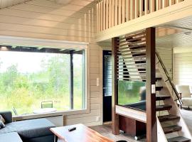 Hietavilla Pl&auml;k- Hot tube - Sauna - Fireplace - 11kW EV-refuel - Landscape view - Silence - Free WiFi，位于鲁卡的带热水浴缸的酒店