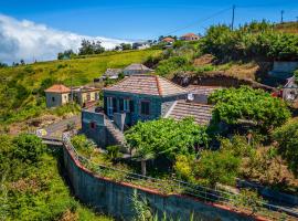 Rainbow Cottage by Madeira Sun Travel，位于蓬塔杜帕戈的酒店