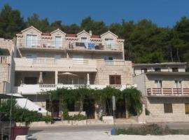 Apartments by the sea Povlja, Brac - 14126，位于波维尔亚的酒店