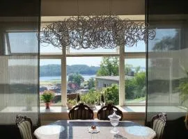 Apartment With a Lake View and Sauna