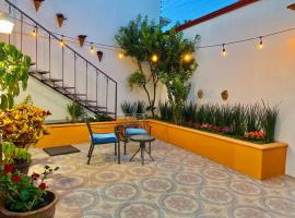 Iluminada y confortable habitaciones en Casa Margarita Oaxaca，位于瓦哈卡市的别墅