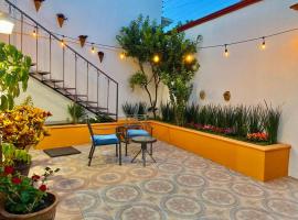 Iluminada y confortable habitaciones en Casa Margarita Oaxaca，位于瓦哈卡市的酒店