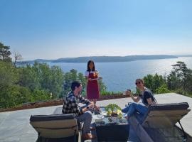 Nils Bastu Spa och Övernattningstuga，位于Tyresö的酒店