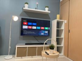 1 BR Cozy Modern-Style Condo with Balcony & 5-star amenities at Wind Residences，位于大雅台的酒店